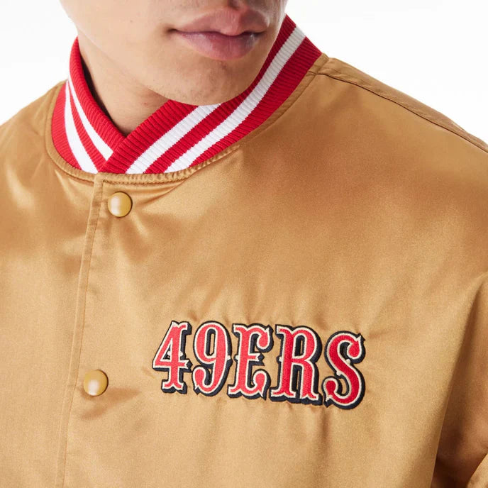 Unique beige satin bomber jacket featuring 49ers branding in American style