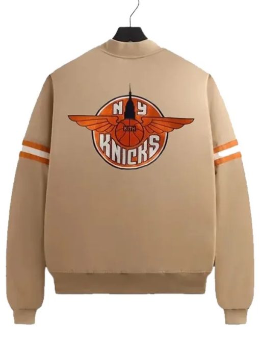 Beige jacket with Knicks logo on a white background