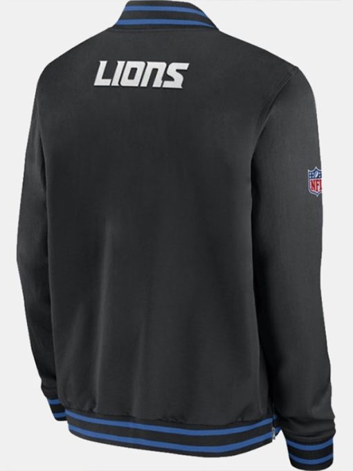 Black jacket with 'Lions' branding on the back, featuring a logo on the sleeve.