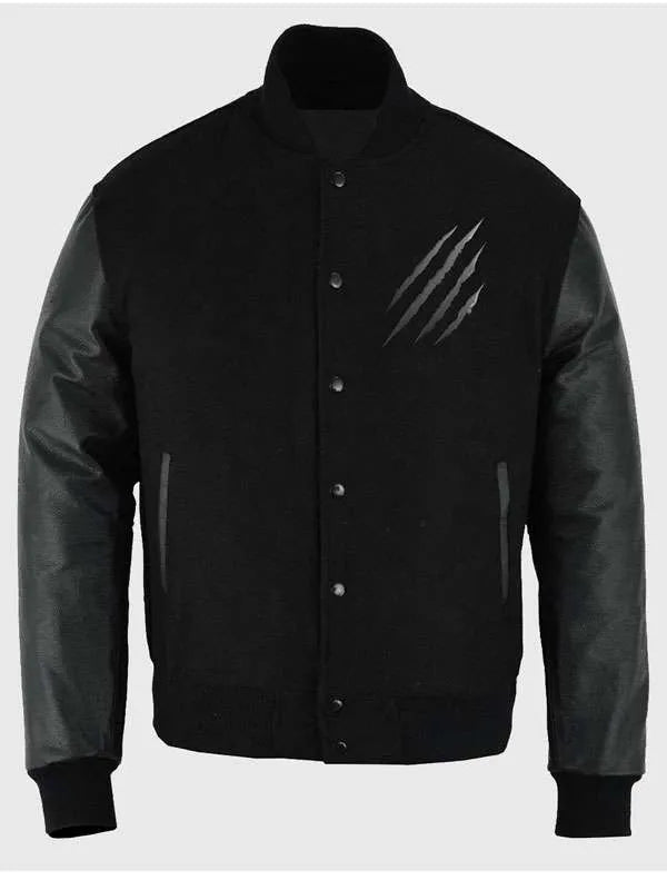 Black varsity jacket with leather sleeves on a white background