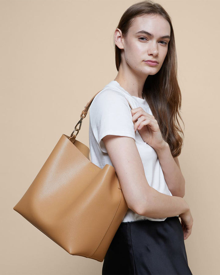 Experience luxury and functionality with the Leather Legacy Satchel
