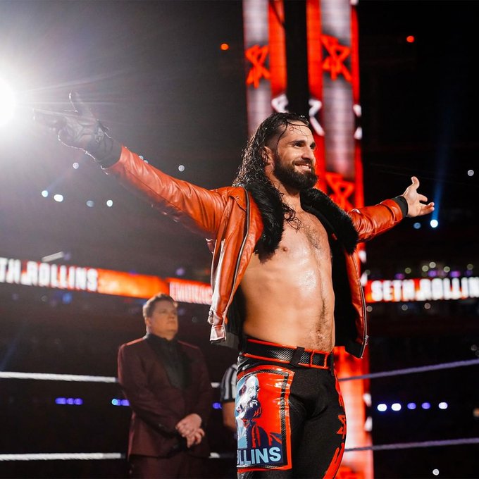 Seth Rollins' WWE attire: Stylish black leather jacket with faux shearling collar in UK market