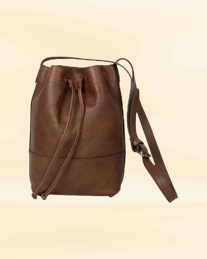 Our leather bucket bag in a everyday setting, ideal for the American consumer looking for a fashion-forward and functional bag