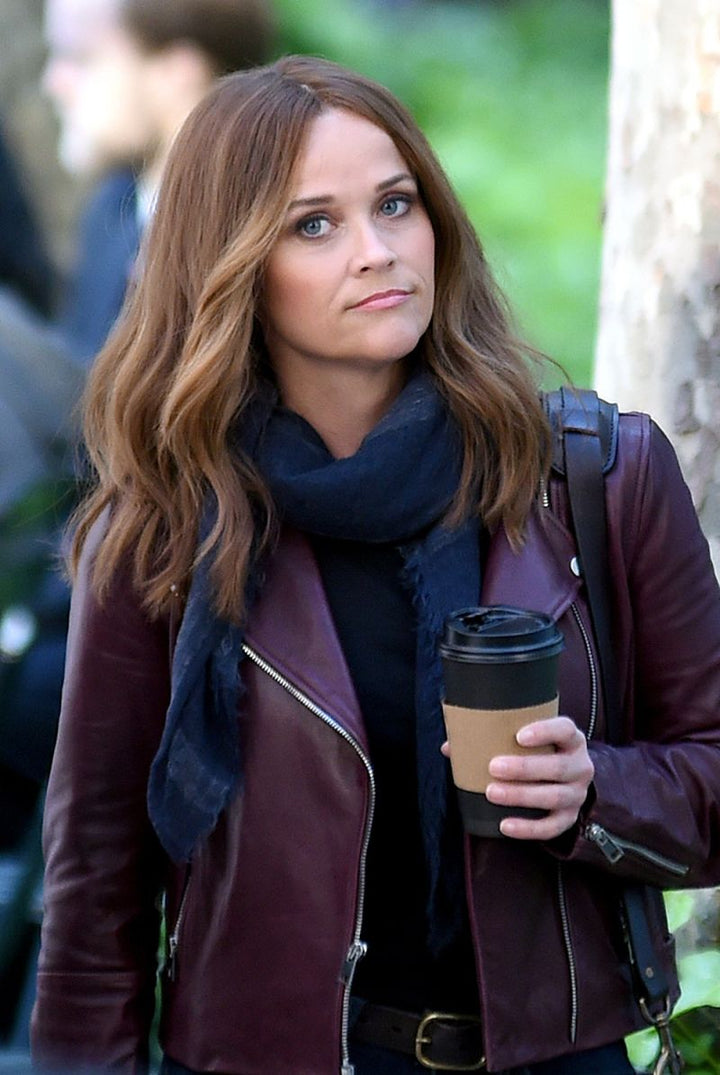 Sophisticated leather jacket worn by Reese Witherspoon in a bold purple color in American style
