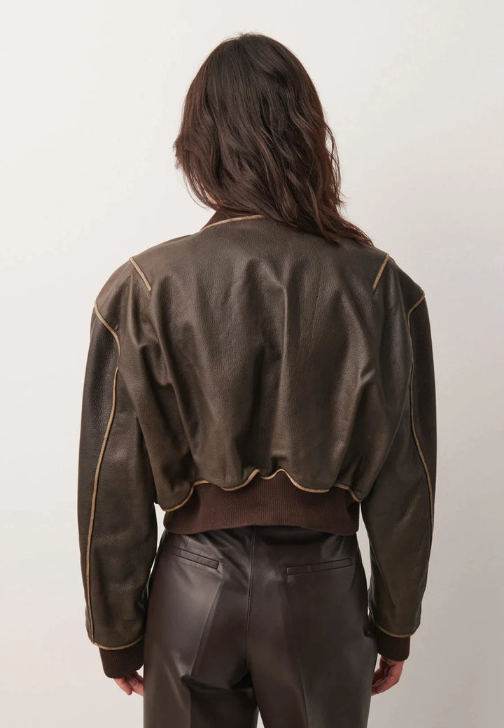 Chic women's cropped jacket with a distressed vintage look in France style