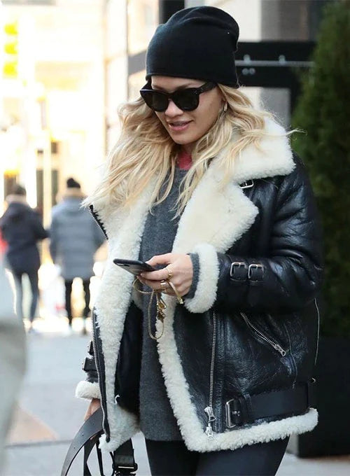 Rita Ora's trendy black leather jacket outfit in UK market