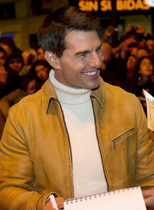 Mission Impossible 4 star Tom Cruise rocks a sleek leather jacket at the movie's premiere in USA market