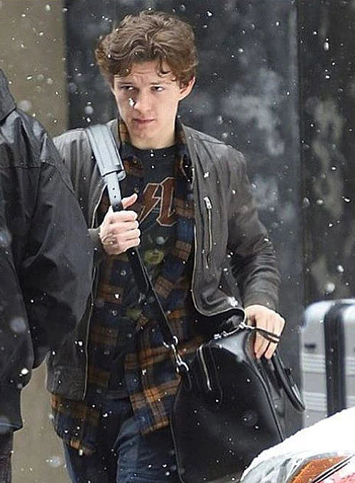 Experience the confidence and charm of Tom Holland with this elegant black leather jacket in US market'